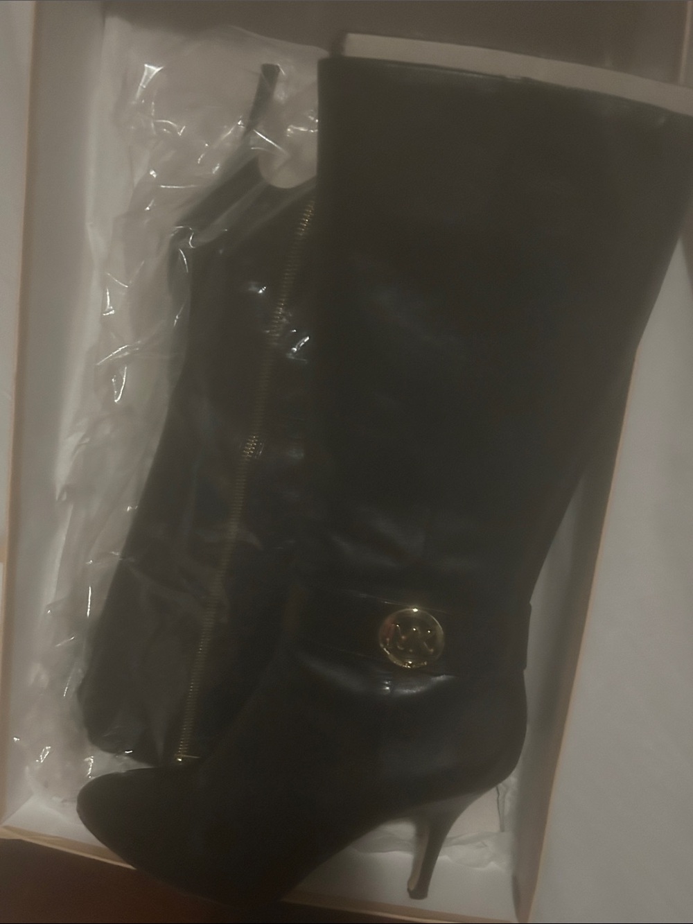 MICHAEL Michael Kors Black Knee-High Leather Boots with Gold Emblem